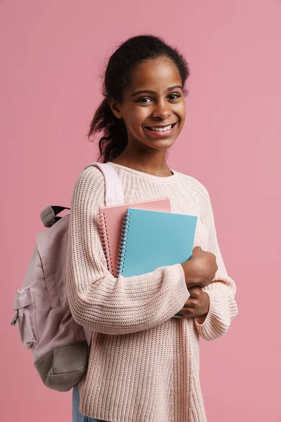 Black Girl Smiling While Posing Exercise Books Backpack Isolated Pink — Foto de Stock