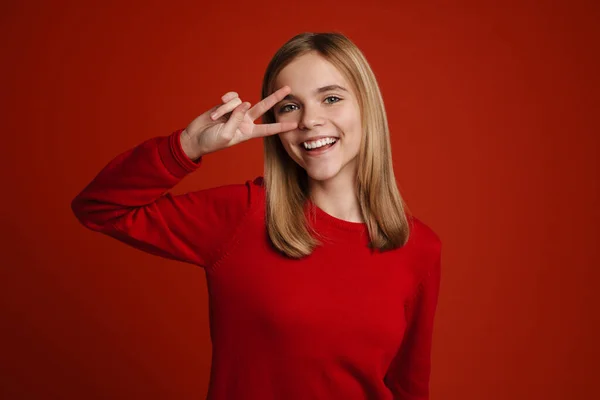 Blonde White Girl Laughing While Showing Peace Sign Isolated Red — Φωτογραφία Αρχείου