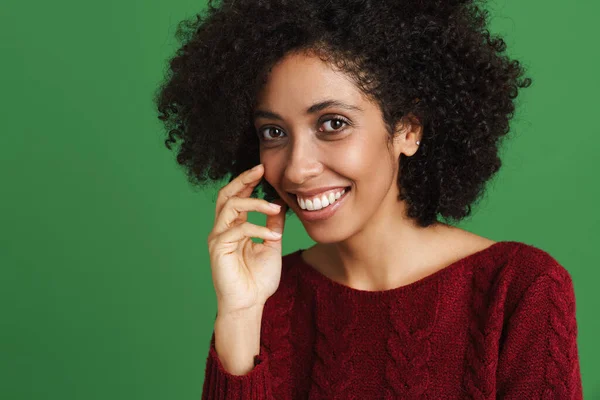 Black Young Woman Wearing Sweater Smiling Looking Camera Isolated Green — стоковое фото