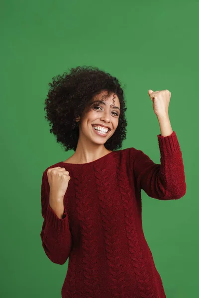 Black Young Woman Smiling Making Winner Gesture Isolated Green Background — Stockfoto