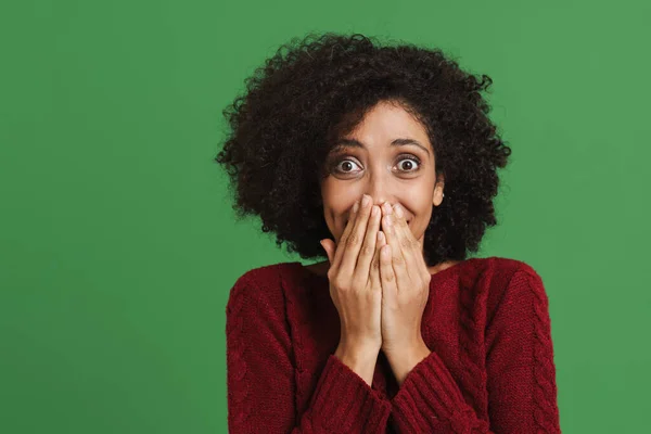 Black Excited Woman Wearing Sweater Expressing Surprise Camera Isolated Green — Stockfoto