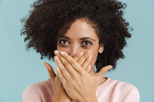 Young Black Woman Covering Her Mouth Looking Camera Isolated Blue — Stockfoto