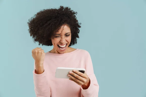 Young Black Woman Gesturing While Playing Online Game Cellphone Isolated — Fotografia de Stock