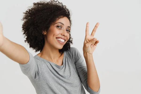 Young Black Woman Curly Hair Gesturing While Taking Selfie Photo — Foto Stock