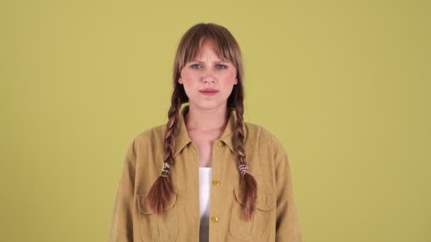 Displeased Blonde Woman Pigtails Showing Silence Gesture Camera Isolated Green — Vídeo de Stock