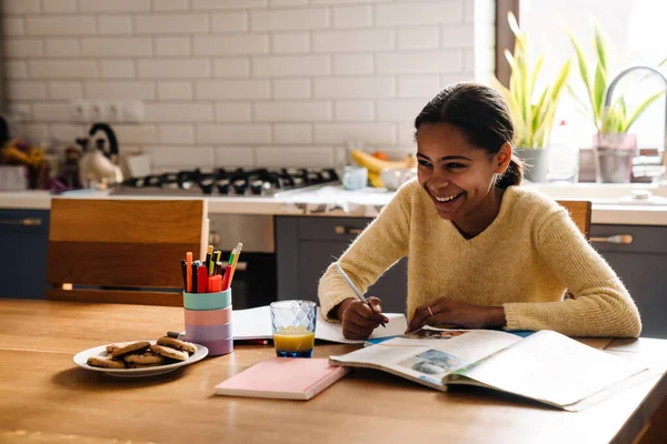 Black Happy Girl Laughing While Doing Homework Kitchen Home — ストック写真