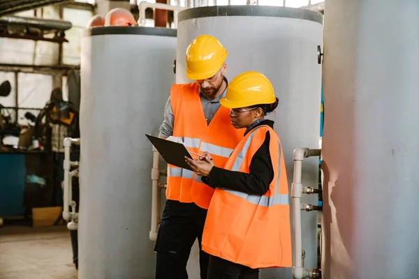 Multiracial Man Woman Protective Clothing Working Together Factory — Stok fotoğraf