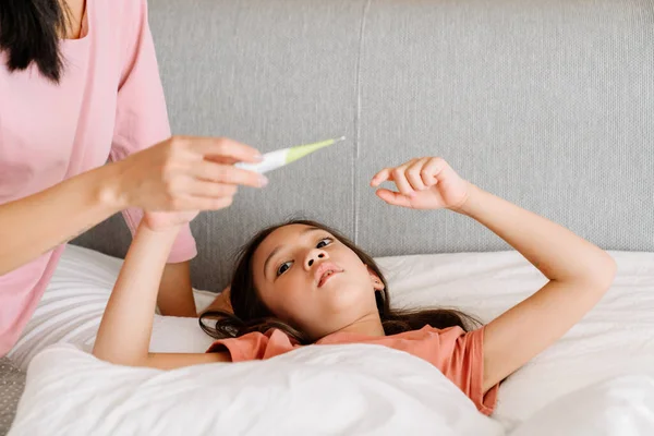 Asian Girl Flu Measuring Temperature While Lying Bed Home — Foto de Stock