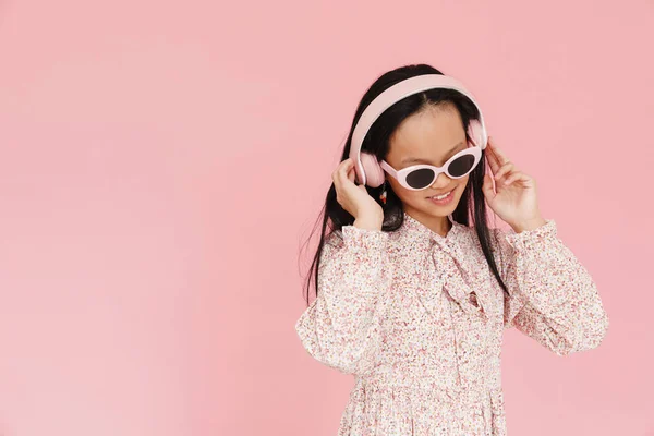Asian Girl Dancing While Listening Music Headphones Isolated Pink Background — Stock Photo, Image