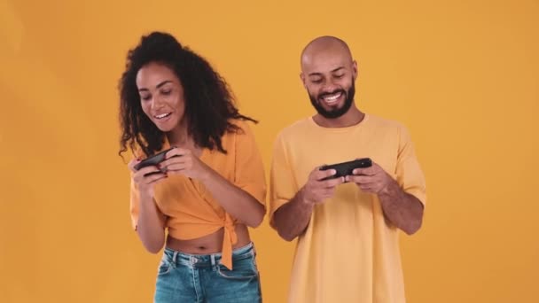 Rejoicing Hispanic Couple Playing Video Game Phone Looking Each Other – Stock-video