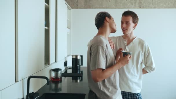 Happy Multinational Gay Couple Talking While Standing Kitchen — Vídeo de Stock