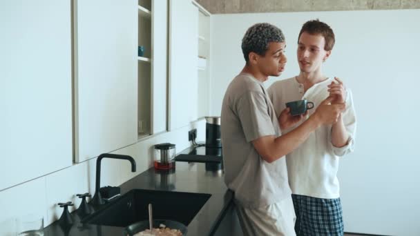 Confident Multinational Gay Couple Talking Holding Hands While Standing Kitchen — Stock video