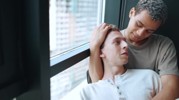 Happy Multinational Gay Couple Talking Home — Vídeos de Stock
