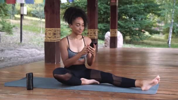Smiling Hispanic Brunette Woman Talking Video Call Phone Yoga Exercises — Stockvideo