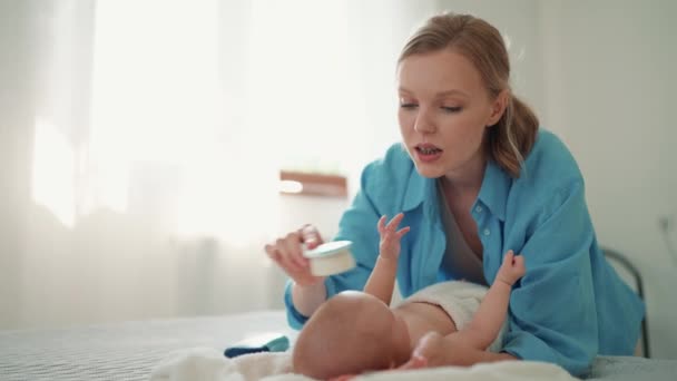 Lovely Blonde Mother Talking Brushing Hair Her Little Baby Lying — Wideo stockowe