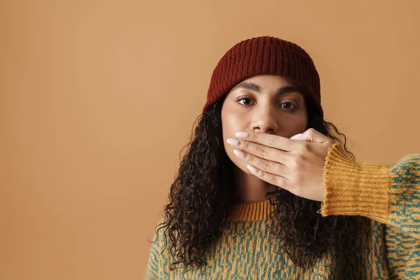 Young Black Woman Wearing Hat Covering Her Mouth Isolated Beige — Stockfoto