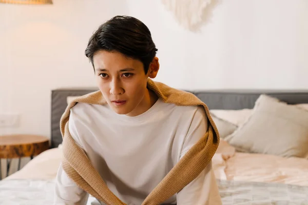 Asian Boy Wearing Shirt Sitting Bed While Resting Home — Fotografia de Stock