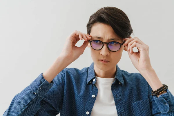 Asian Boy Wearing Eyeglasses Posing Looking Aside Isolated White Background — Stockfoto