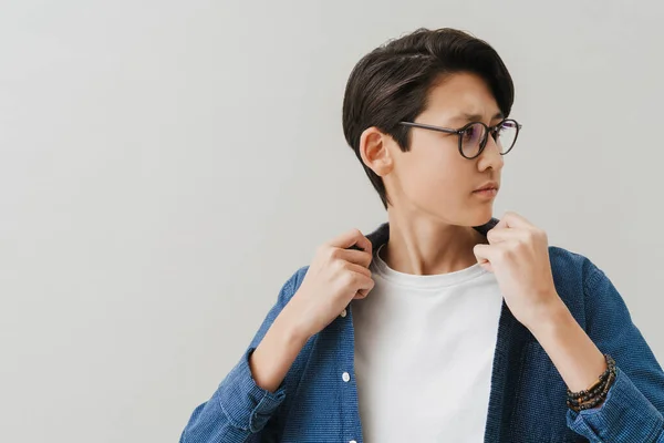 Asian Boy Wearing Eyeglasses Posing Looking Aside Isolated White Background — Stok fotoğraf