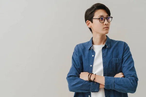 Asian Boy Wearing Eyeglasses Posing Looking Aside Isolated White Background — Stok fotoğraf