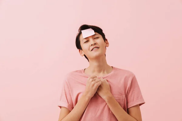 Asian Boy Smiling While Posing Sticker Forehead Isolated Pink Background — Stock Photo, Image