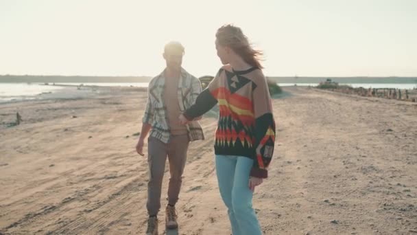 Positive Blond Couple Holding Hands Walking Estuary Outdoors — Stock Video