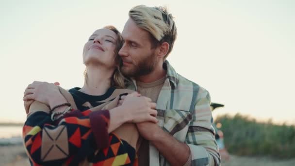 Happy Blond Young Couple Hugging Estuary Outdoors — Stock Video