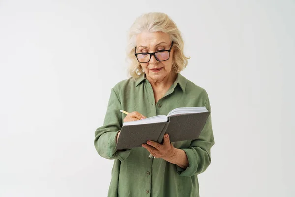 Grey Senior Woman Eyeglasses Writing Notes Planner Isolated White Background — Stock Photo, Image