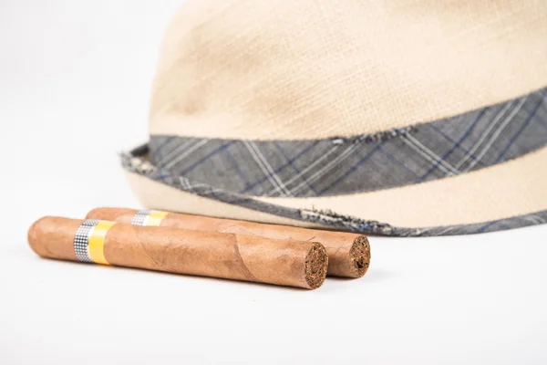 Cuban cigar and hat — Stock Photo, Image