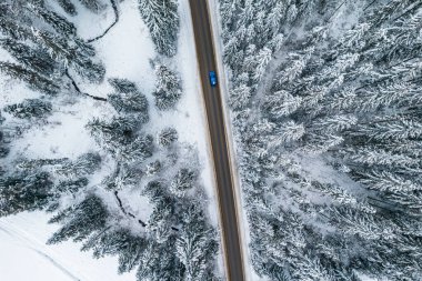 Winter Road in Mountains. Drone View.