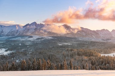 Beautiful Winter Sunset in Snow Covered Tatra Mountains, Poland.