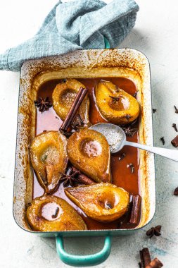 Pears Baked in Caramel and Spices. Festive Christmas Sweet Food.