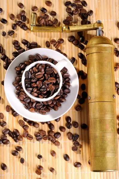 Coffee beans with grinder — Stock Photo, Image