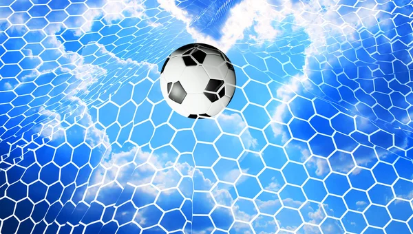 Ballon de football contre le ciel — Photo