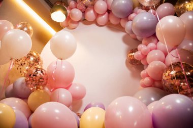 photo zone of pink balloons with a place for an inscription
