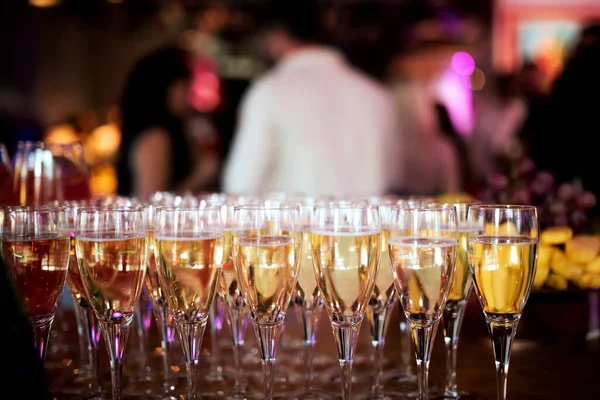 Lot Glasses Champagne Background Blurred People Imagen de stock