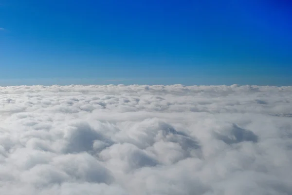 Blue sunny sky with clouds — Stock Photo, Image