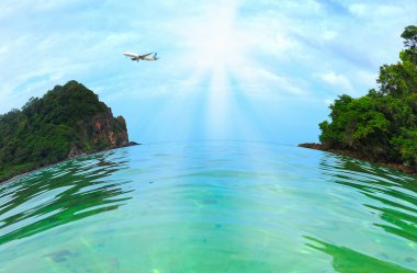 açık denizde tropik ada