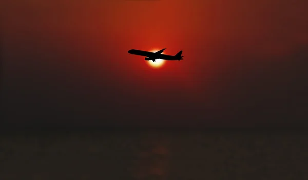 空を飛んでいる、夜の航空会社 — ストック写真