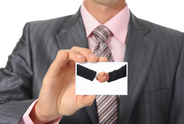 Businessman handing a card — Stock Photo, Image