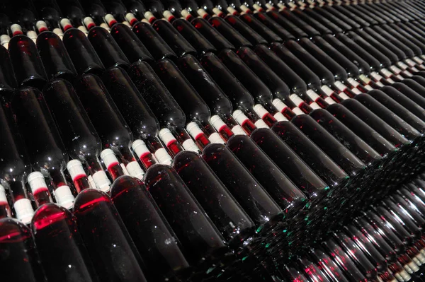 Old bottles of red wine — Stock Photo, Image