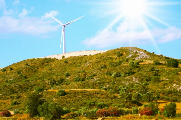 Large windmill on the hill sunny day — Stock Photo, Image