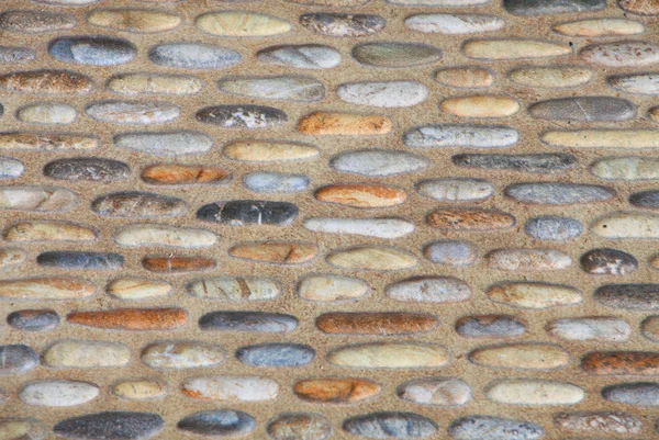 Pedras do mar com seixos praia — Fotografia de Stock