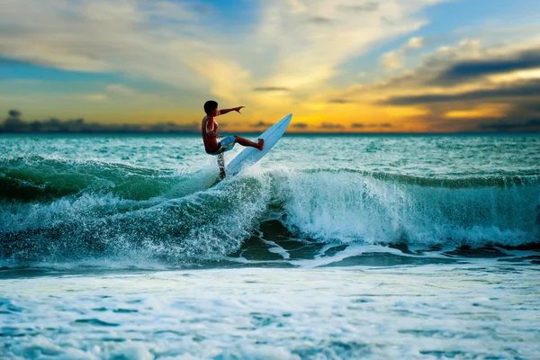 Athletic surfer with board — Stock Photo, Image