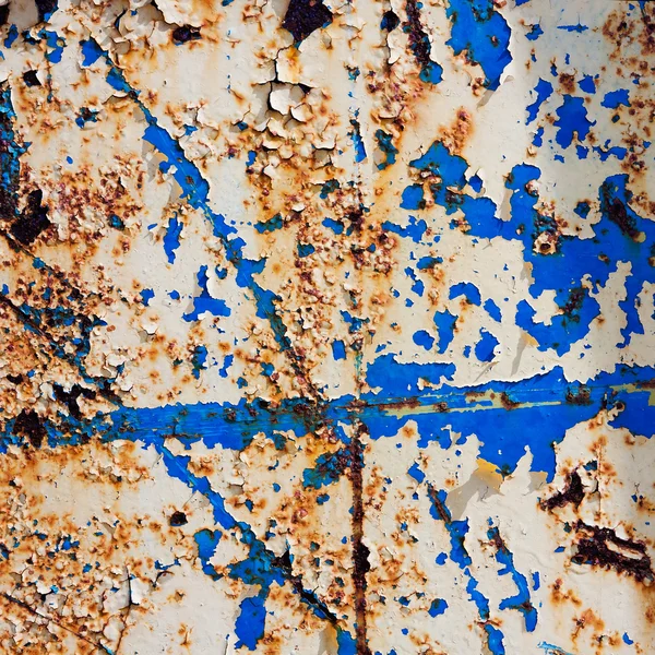 Металлокоррозионная текстура с треснувшей краской — стоковое фото