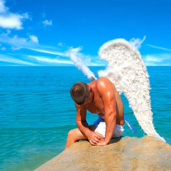 Людина носіння ангел-Вінгс — стокове фото