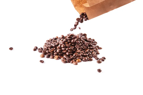 Paper bag with grain coffee on white background — Stock Photo, Image