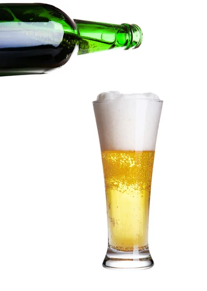 Beer pouring from green bottle into glass isolated on white — Stock Photo, Image