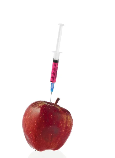 Red apple and syringes isolated on white — Stock Photo, Image