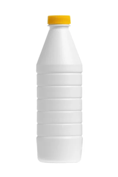 Пляшка молока з жовтою шапочкою ізольована на білому тлі — стокове фото